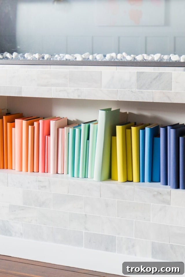 Vibrant Bookcase Transformation 2 DIY Color-Coded Bookshelf by top Houston lifestyle blogger Ashley Rose of Sugar and Cloth - colorful bookshelf