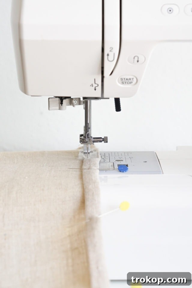 How to Make a Rug Hooked Pillow 19 Step 13: Sewing the pillow layers together on a sewing machine, using the hooked panel as a guide.