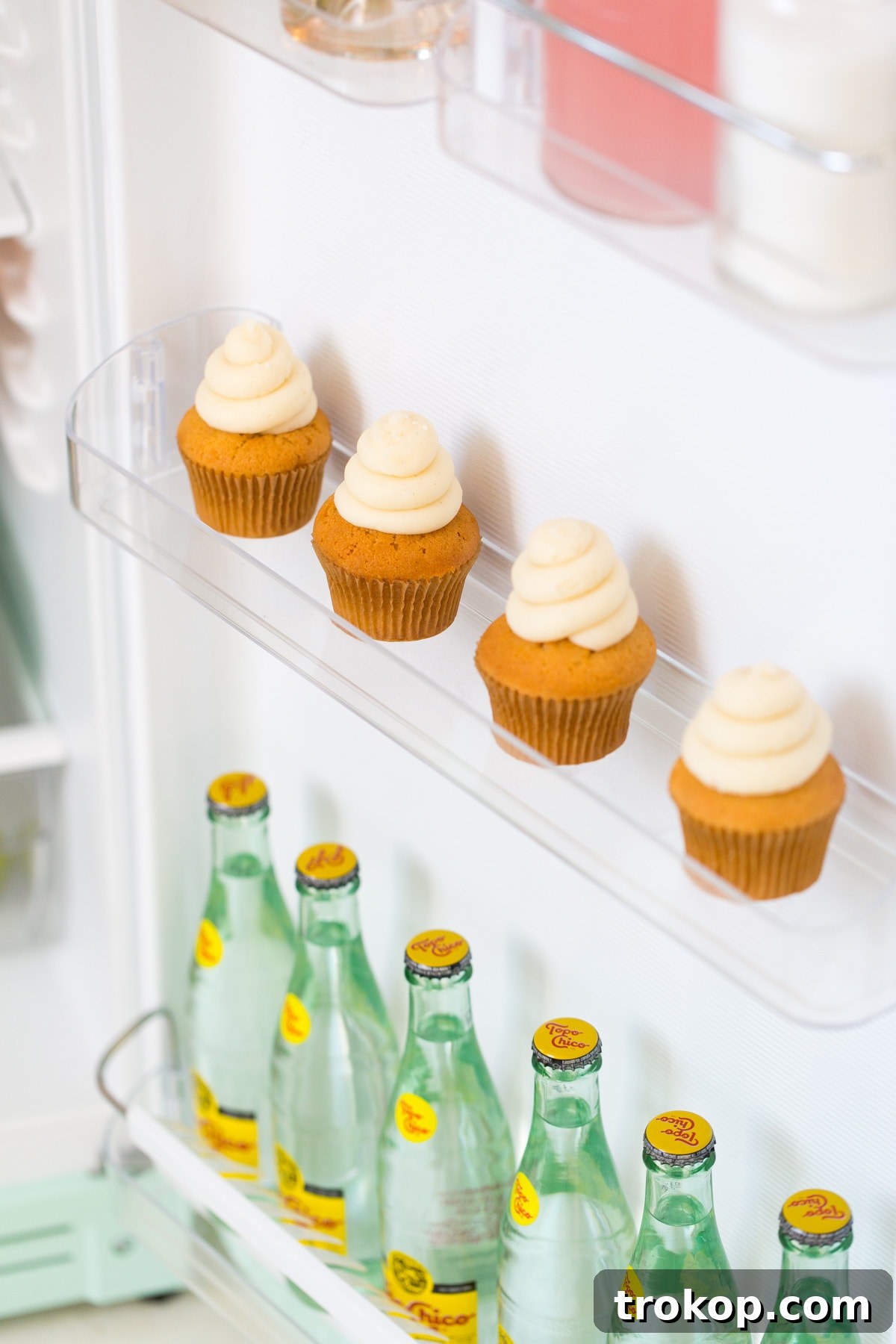 Close-up of organized refrigerator door shelves