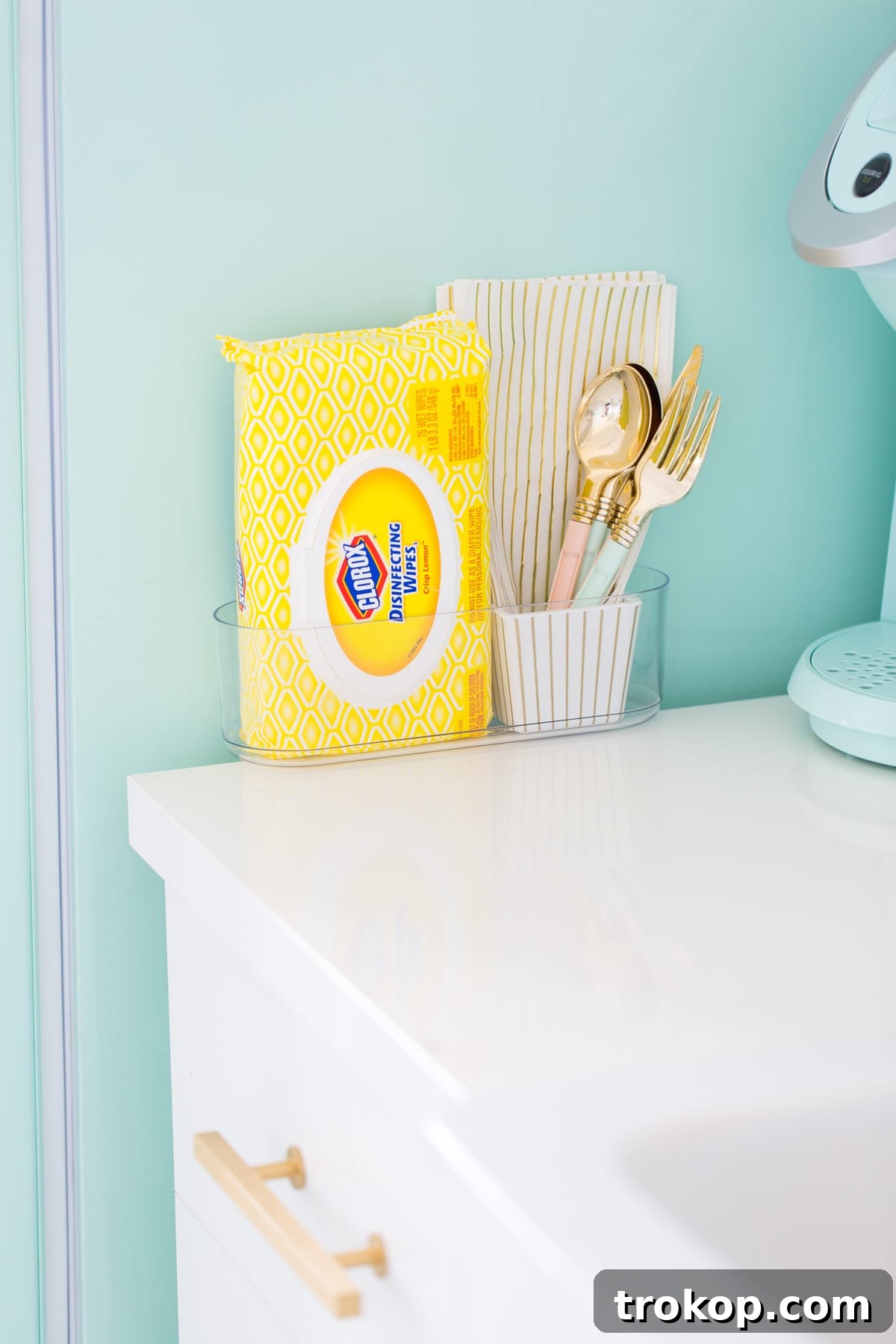 6 Unexpectedly Delightful Hacks for a Sparkling Spring Fridge 7 Magnetic basket on the side of a refrigerator holding various items