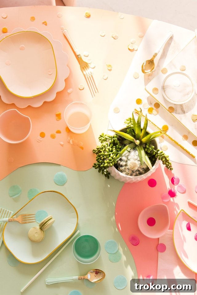 Overhead view of DIY paper color block table covering with refreshments