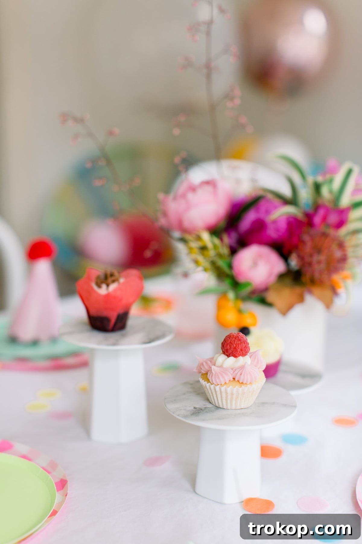 The grand finale: a full view of the stunning colorful pom pom birthday party, showcasing all the festive elements and joyful atmosphere.