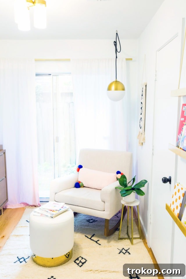 Little Sugar and Cloth Presents Gwen's Nursery Reveal 5 Flamingo Wallpaper Accent Wall in Gwen's Nursery with a Custom Neon Sign