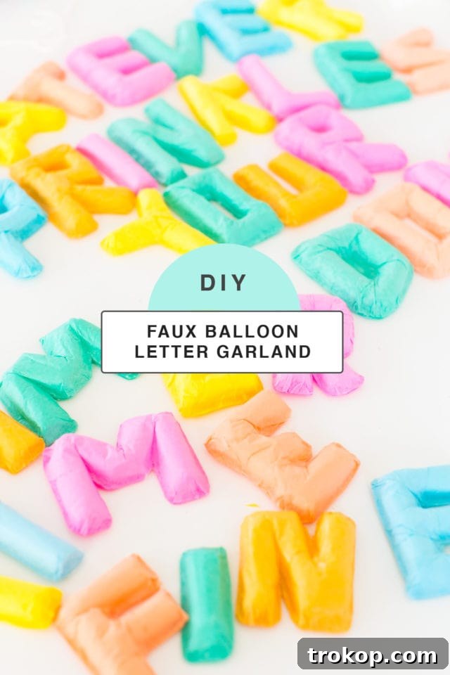 Completed faux letter balloon banner, a durable and charming decoration that won't deflate