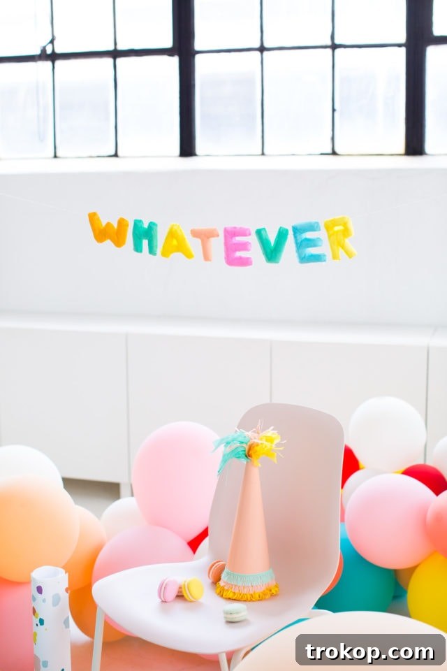 Playful 'Whatever!' Faux Balloon Letter Banner adding a fun touch to any celebration