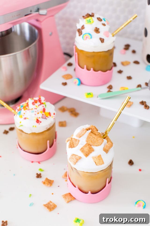 The Ultimate Cereal Milk Cold Brew 8 Finished cereal milk cold brew coffee with whipped cream and cereal garnish, by top Houston lifestyle blogger Ashley Rose of Sugar and Cloth