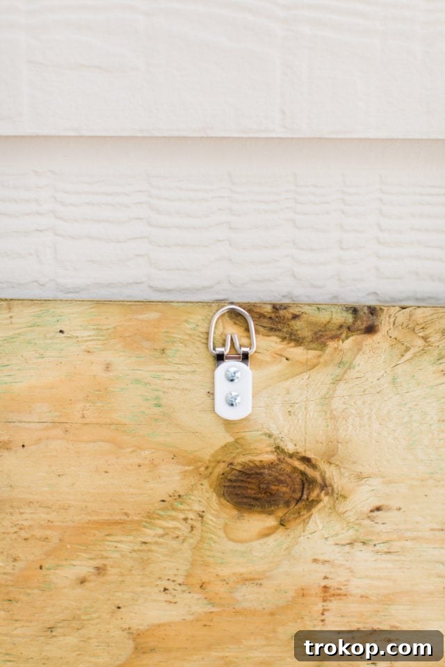 Plywood backing for faux boxwood wall