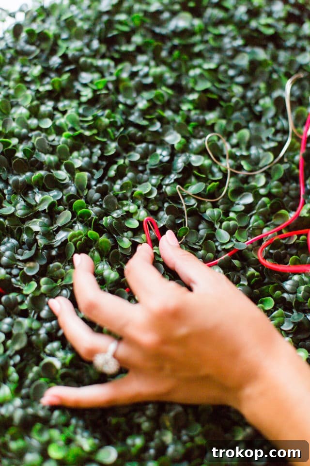 Lush Greenery Meets Neon Radiance 7 Applying glue to EL wire for DIY neon sign