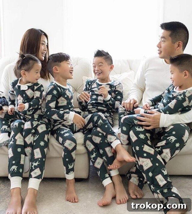 Festive Family Fun: Matching Family Christmas Pajamas 13 Burt's Bees Baby organic cotton family Christmas pajamas with a 'Letters to Santa' print.