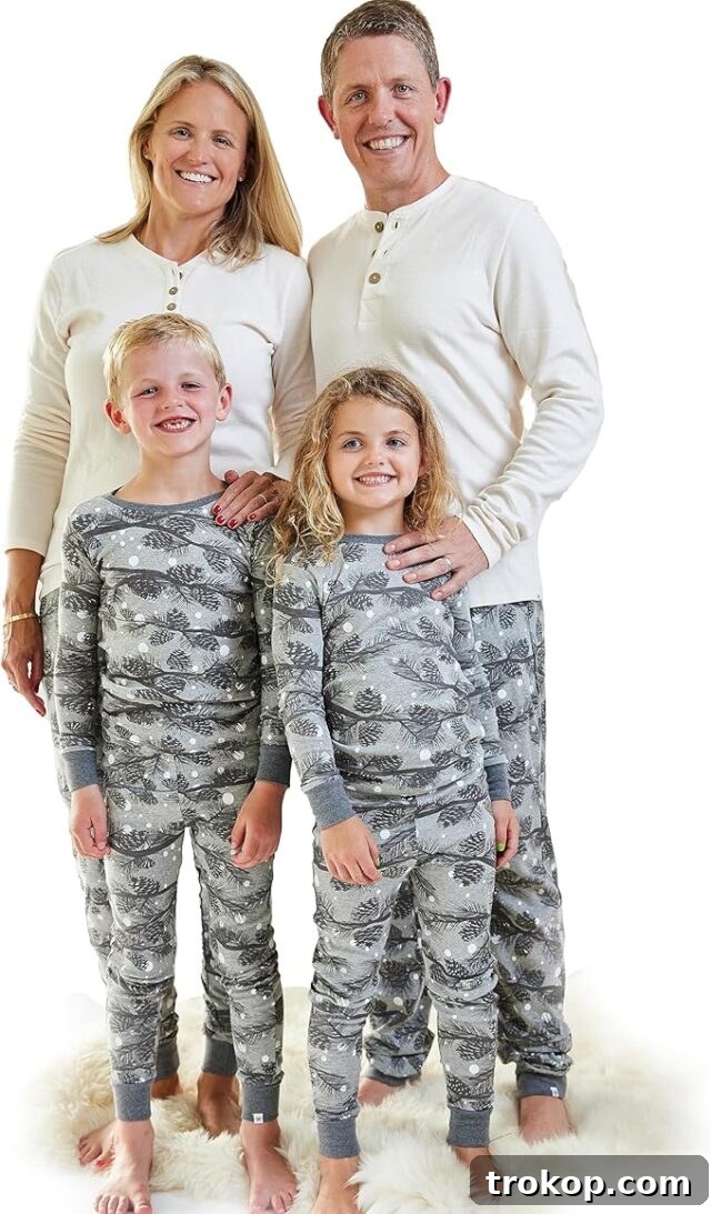 Festive Family Fun: Matching Family Christmas Pajamas 16 HonestBaby Organic Cotton Holiday Family Jammies pajamas with a night pine print.