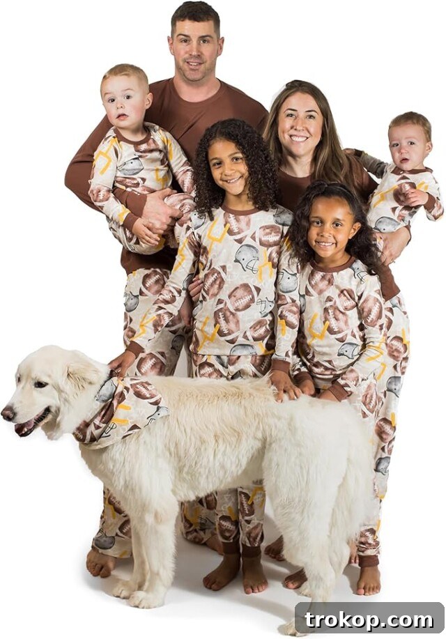 Festive Family Fun: Matching Family Christmas Pajamas 17 Burt's Bees Baby organic cotton family pajamas with a festive football theme for Christmas.