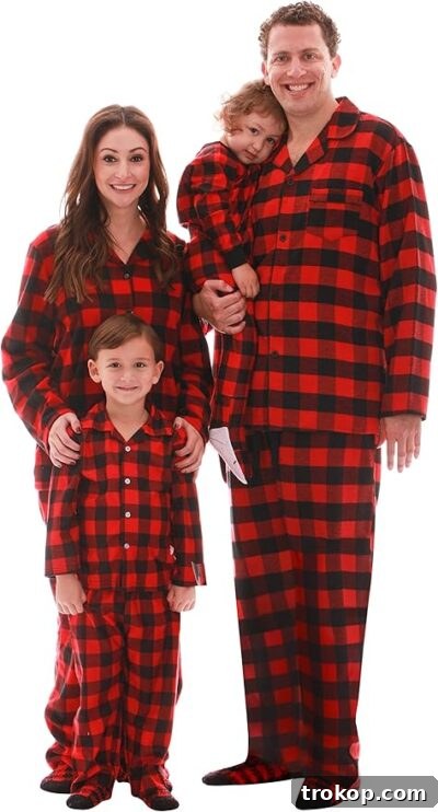 Festive Family Fun: Matching Family Christmas Pajamas 18 Family pajamas featuring a gender-neutral buffalo plaid flannel set with matching socks.