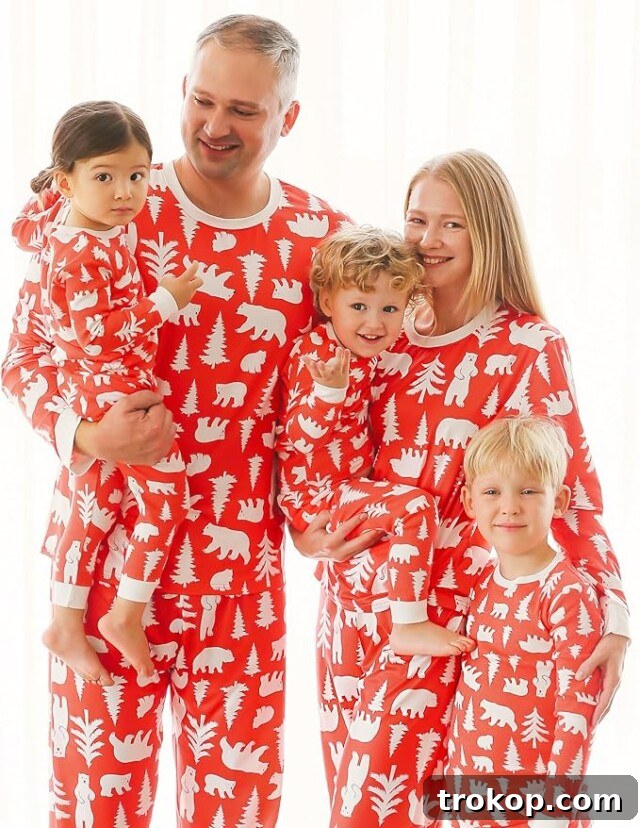 Festive Family Fun: Matching Family Christmas Pajamas 3 Family matching pajamas with a cute polar bear graphic, perfect for Christmas.