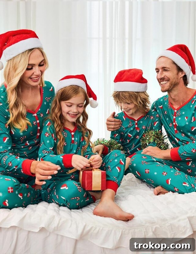 Festive Family Fun: Matching Family Christmas Pajamas 21 Family pajamas set with a modern Christmas hat pattern in red and green.