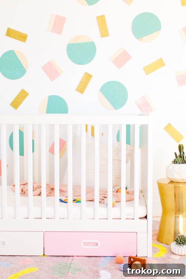 Abstract Shapes DIY Kids Wall Decor by Houston lifestyle blogger Ashley Rose of Sugar and Cloth -- #DIYBABYROOMDECOR #KRYLON #SPRAYPAINTPROJECT #NURSERYIDEAS