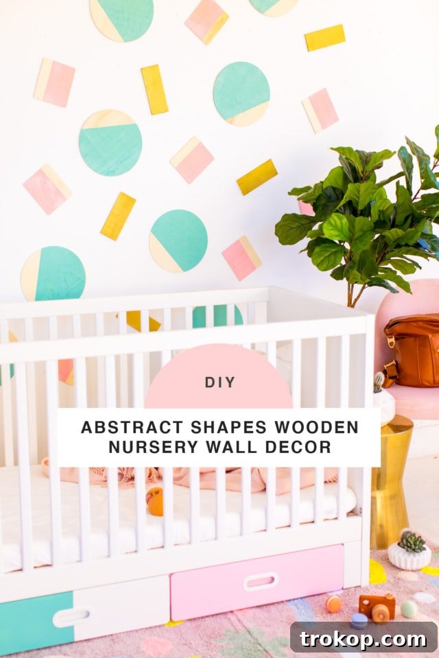 Abstract Shapes DIY Nursery Wall Decor by Houston lifestyle blogger Ashley Rose of Sugar and Cloth -- #DIYBABYROOMDECOR #KRYLON #SPRAYPAINTPROJECT #NURSERYIDEAS