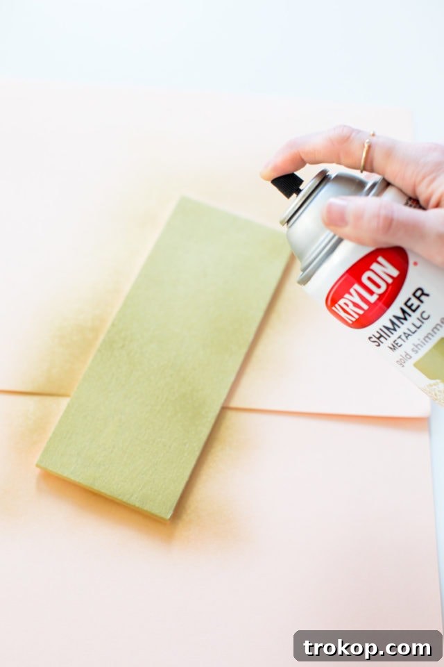 Abstract DIY Spray Paint Wall Decor by Houston lifestyle blogger Ashley Rose of Sugar and Cloth -- #DIYBABYROOMDECOR #KRYLON #SPRAYPAINTPROJECT #NURSERYIDEAS