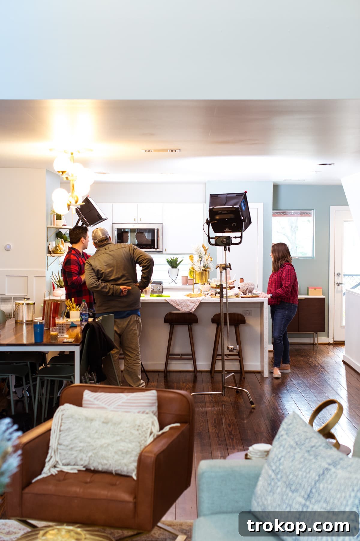 Behind-the-scenes shot from the Crunchmaster video shoot, showing cameras and lighting equipment focused on an interactive bruschetta bar setup.