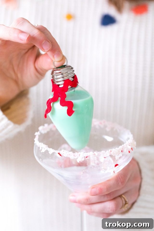 Homemade Holiday Cocktail Baubles 6 Serving up rumchata holiday ornaments in festive glasses with crushed peppermint rims.