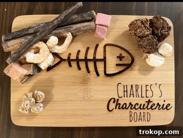 Paws-itively Perfect: Your Guide to Gifts Pets Adore 28 Personalized custom cat charcuterie board made of bamboo, engraved with cat's name