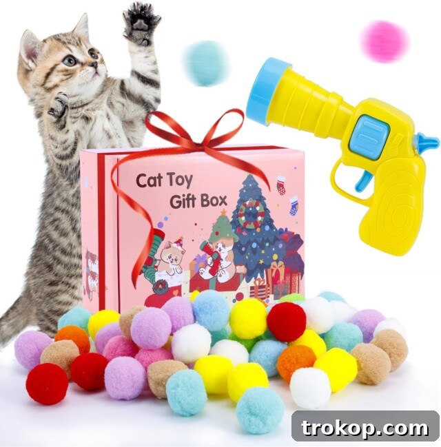 Paws-itively Perfect: Your Guide to Gifts Pets Adore 32 Interactive kitten toys: ball launcher with 80 pom-poms for training and playful cats