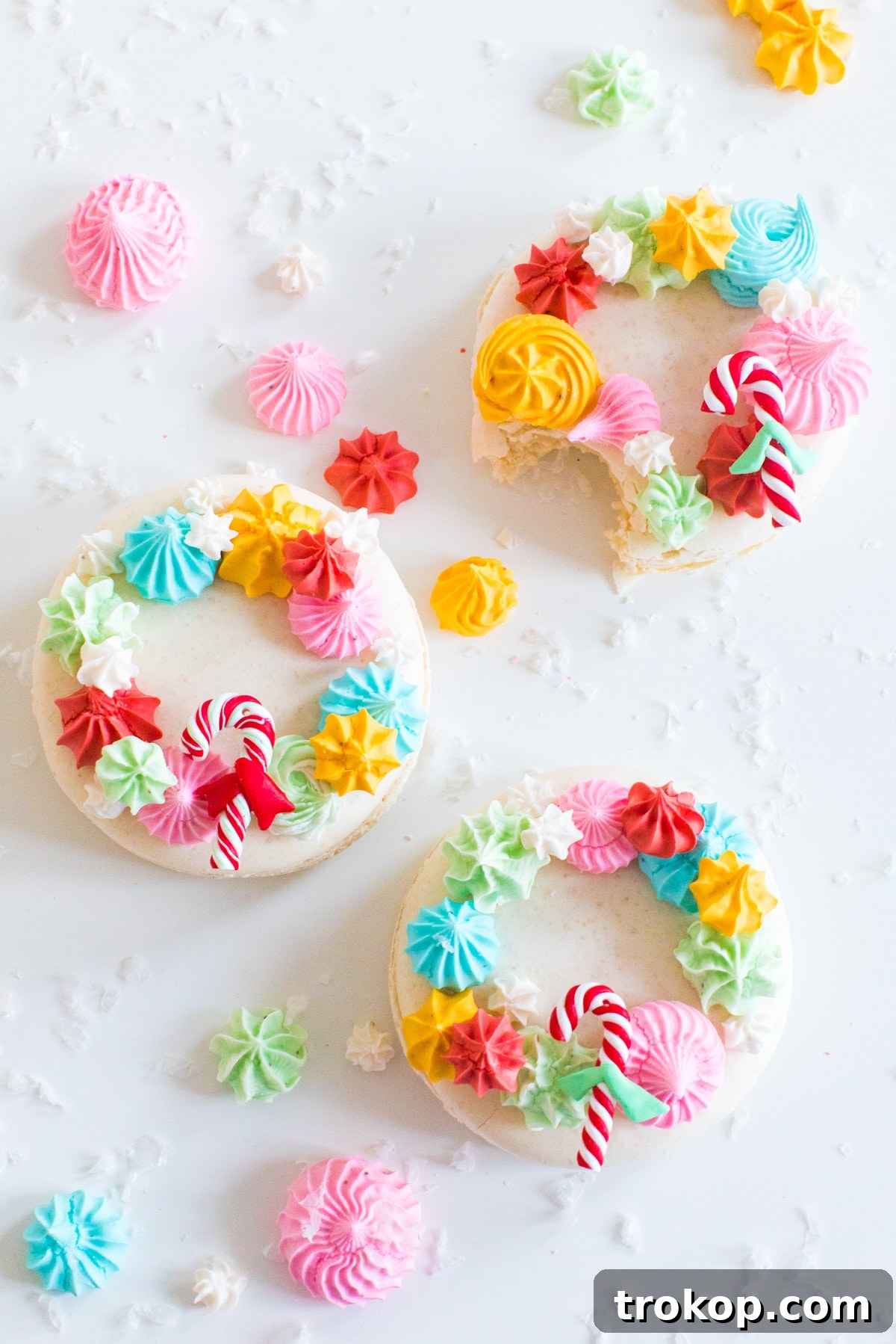 Festive Wreath Macaron Delights 3 christmas macarons! How to Make Holiday Wreath Meringue Macarons by top Houston lifestyle blogger Ashley Rose of Sugar & Cloth #holiday #cookies #meringues #wreath #christmas #ideas