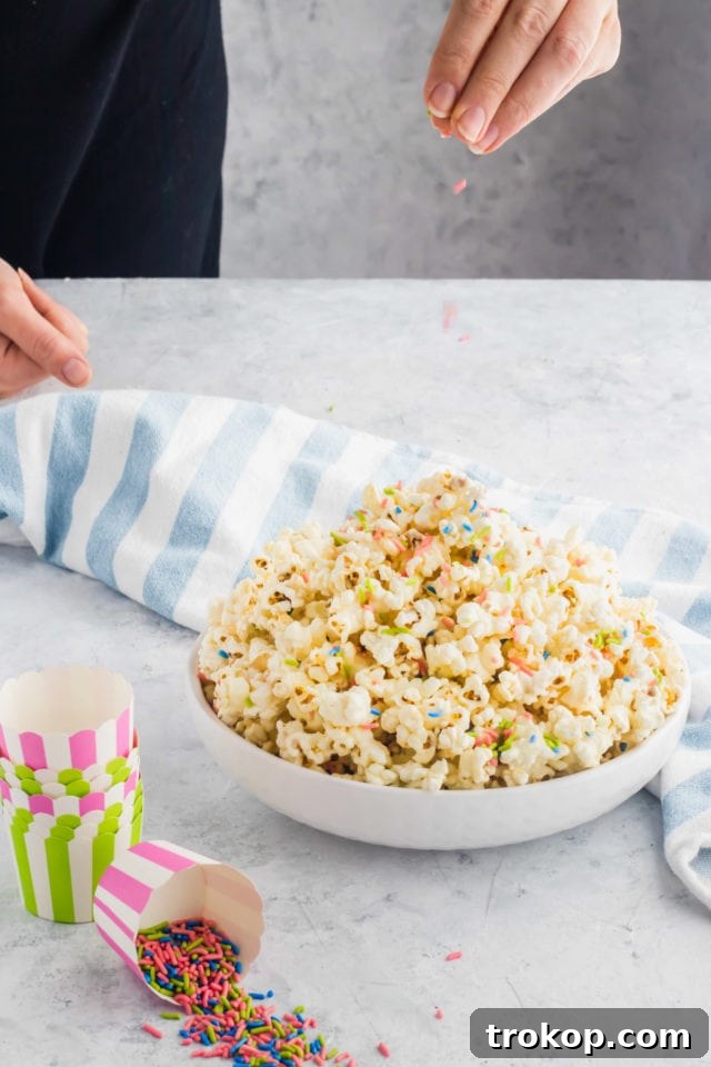 diy white chocolate funfetti popcorn by top Houston lifesyle blogger Ashley Rose of Sugar and Cloth #recipes #entertaining #idea 