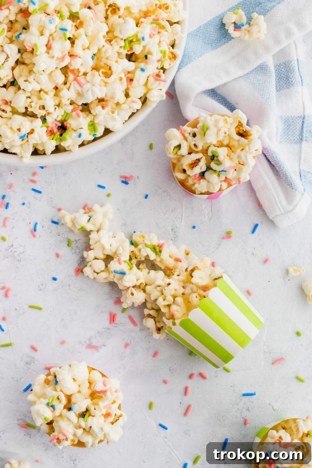 delicious white chocolate funfetti popcorn by top Houston lifesyle blogger Ashley Rose of Sugar and Cloth #recipes #entertaining #idea 
