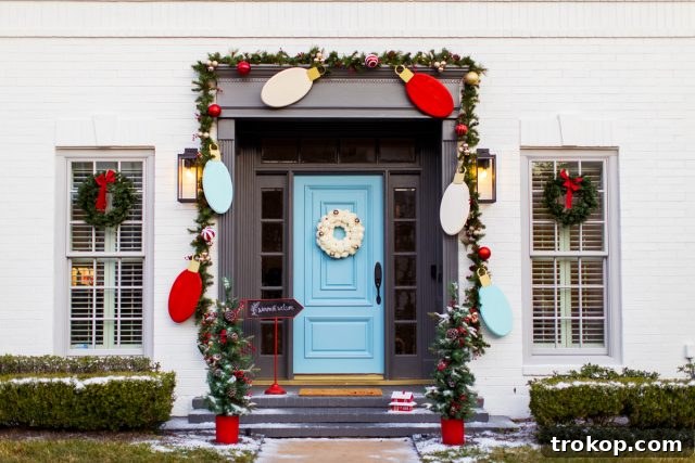 Horizontal view of a vibrant DIY Christmas front door decoration
