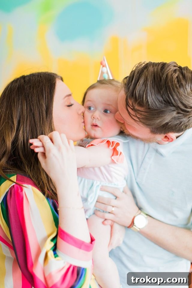 Gwen's first birthday at Honey Art Cafe by Sugar & Cloth, featuring a vibrant, colorful party setup