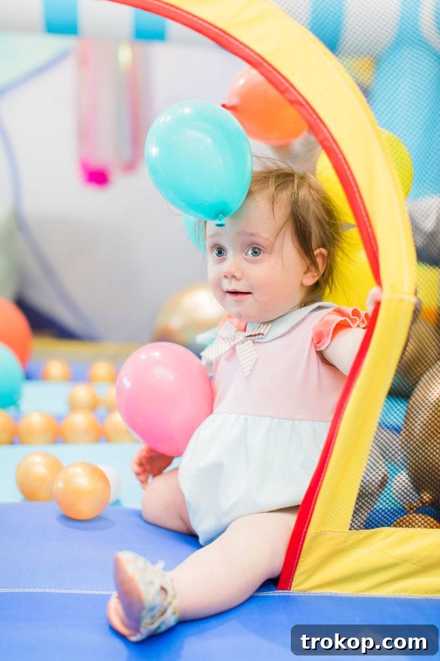 Gwen's first birthday party at Honey Art Cafe, showcasing the vibrant color theme