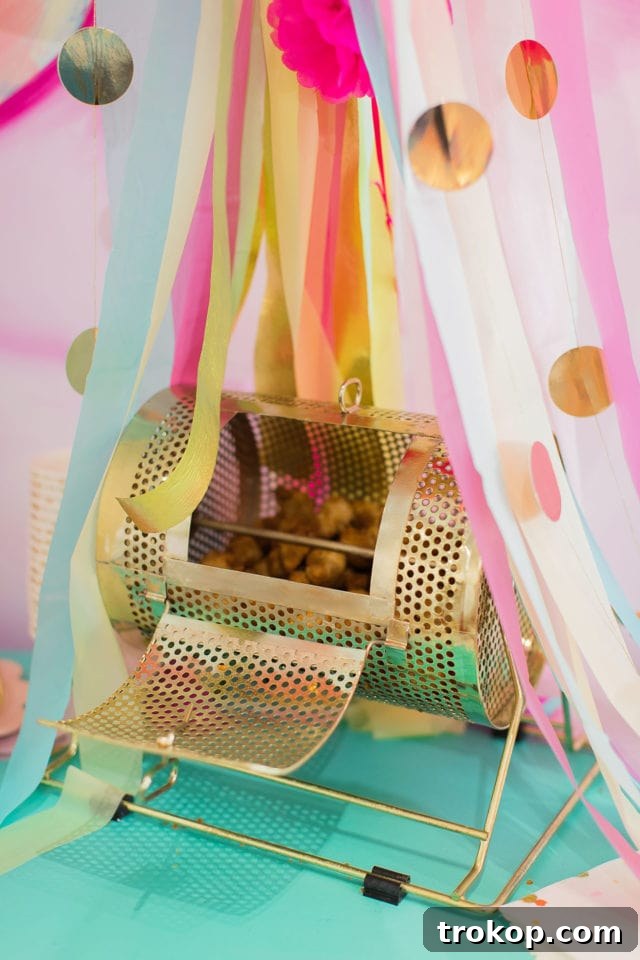 Chick-fil-A chicken nuggets creatively displayed in a gold bingo bin for a first birthday party