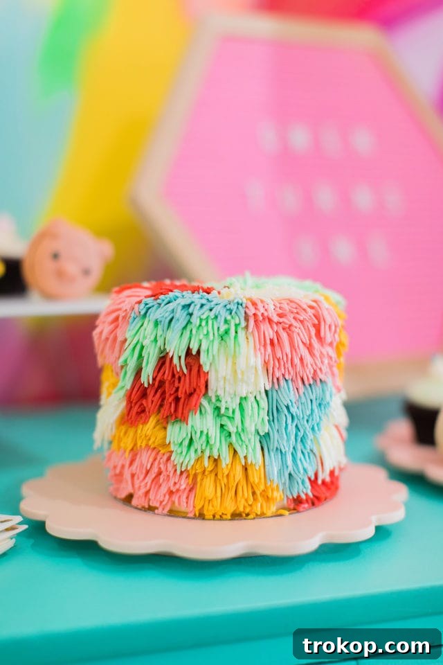 Custom rainbow shag cake for Gwen's first birthday celebration