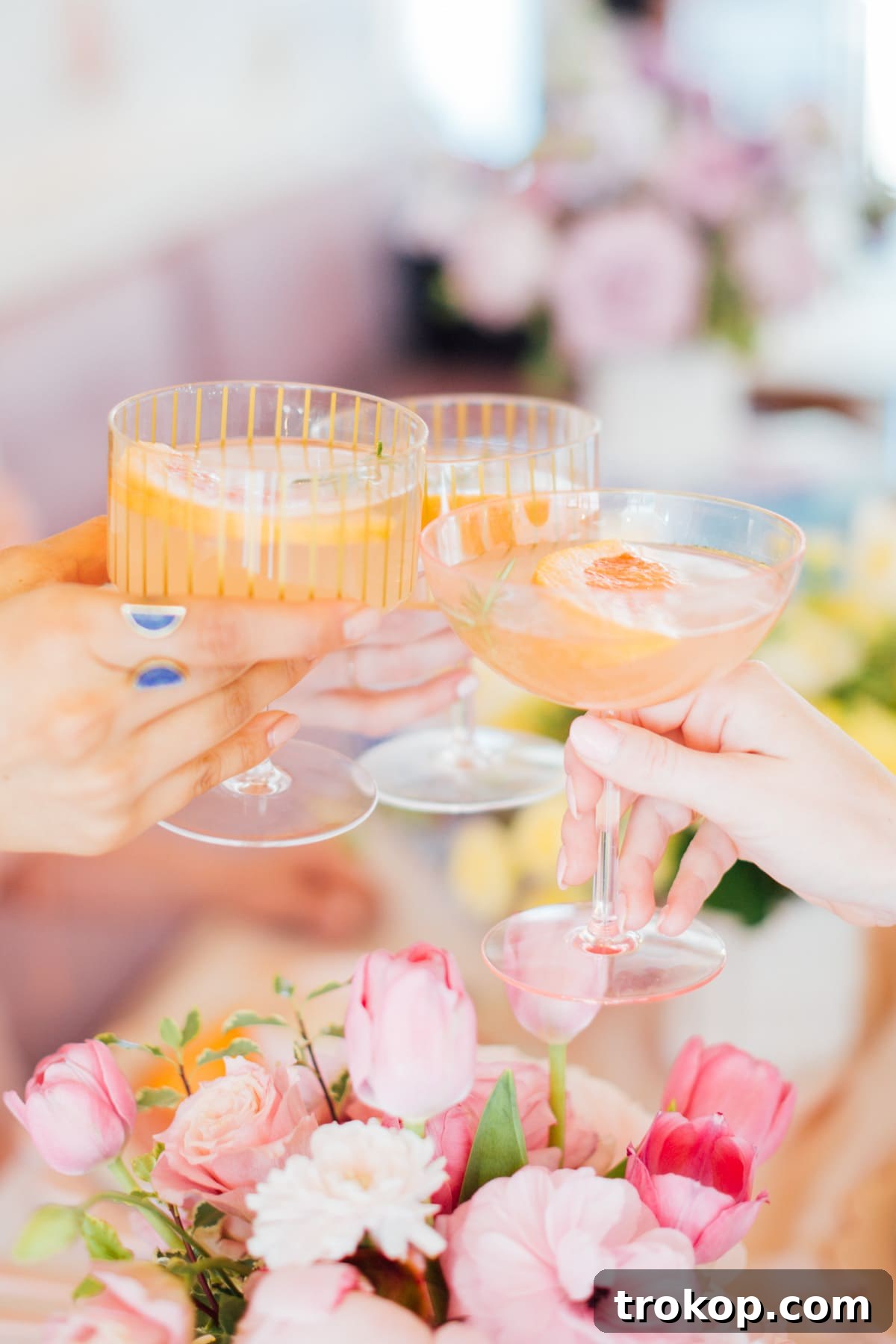 Delicious and pretty brunch cocktails served on a pastel-themed table
