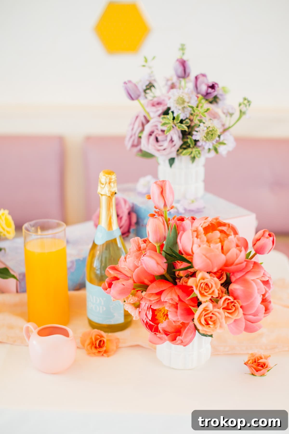 Close-up of gorgeous pastel floral arrangements for a spring table setting