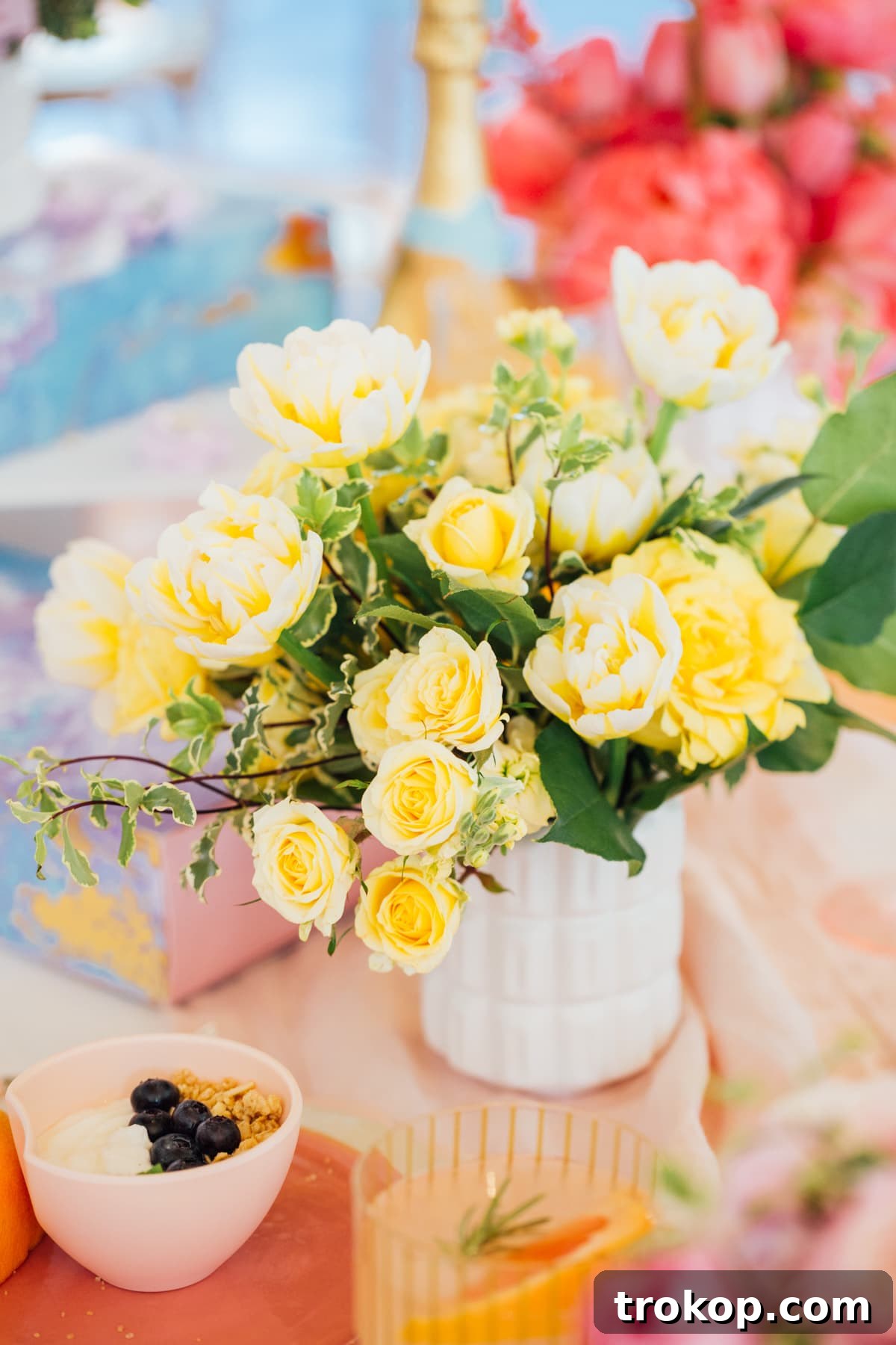 Striking color blocked flower arrangements adding modern flair to the Easter table