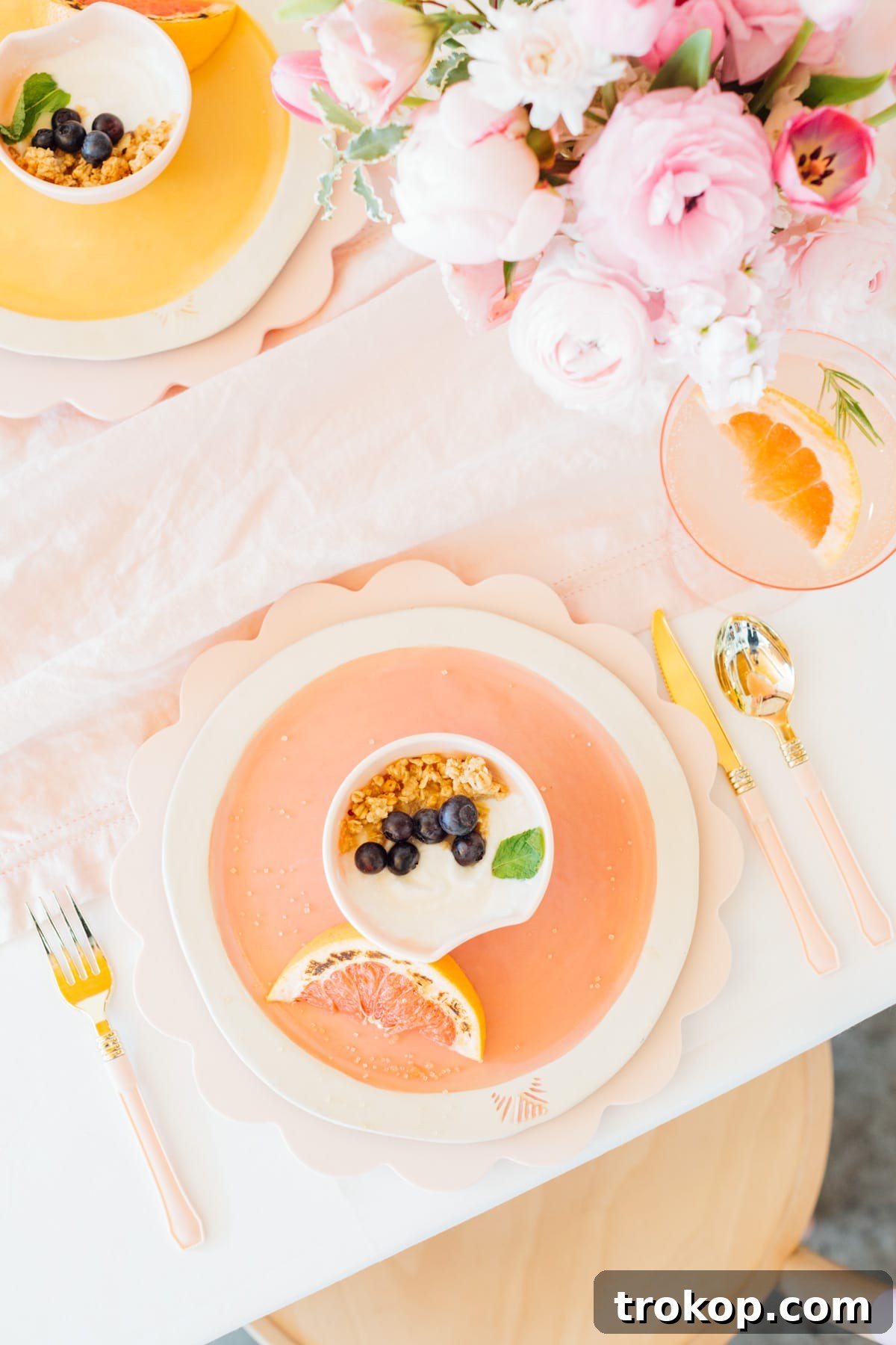 Scalloped serving trays from Sugar & Cloth shop used as stylish chargers