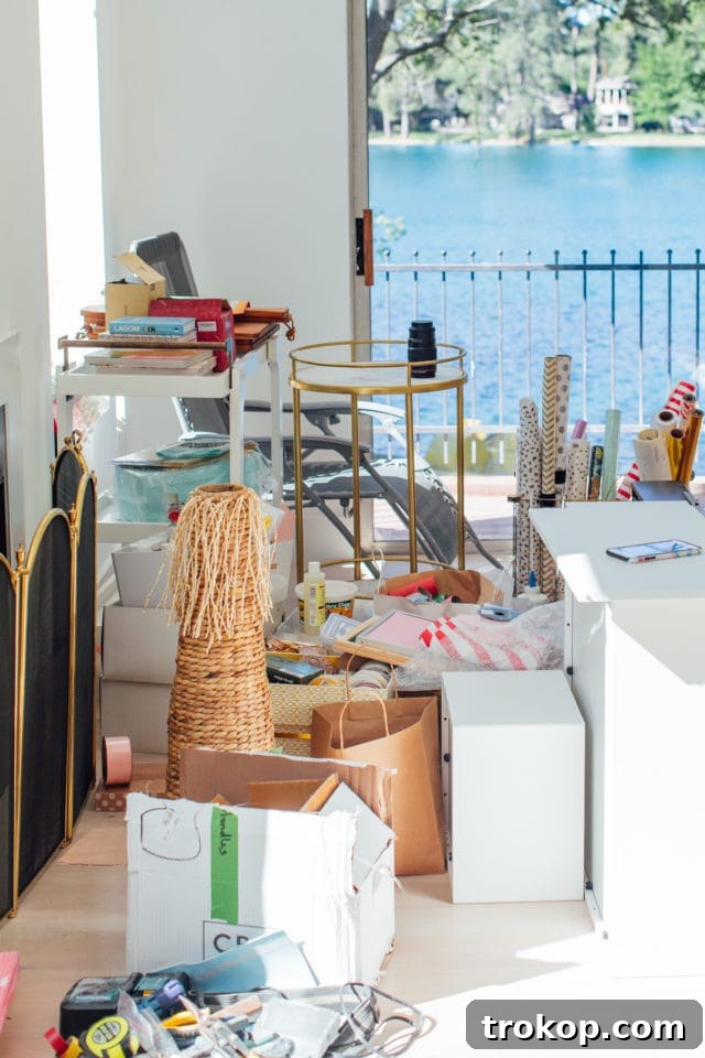 Unveiling My New Studio and Craft Nook 5 A view of the studio during the messy stage of renovation, with moving boxes and supplies, highlighting the temporary disarray before final organization. A peek inside the new studio and craft closet.