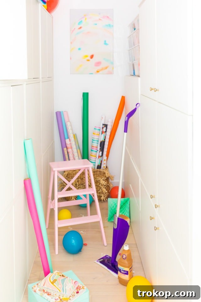 Unveiling My New Studio and Craft Nook 9 A section of the organized craft closet with various colorful supplies, including ribbons, felt sheets, and paper, arranged neatly on shelves.