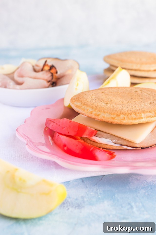 Allergy-Friendly Bites: Healthy Lunches Kids Adore 7 Pancake Sandwiches Recipe for healthy lunch ideas for kids by Sugar & Cloth
