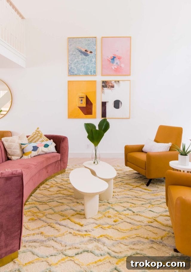 Corner view of the living space highlighting the modern coffee table with rounded corners, a practical choice for homes with young children.