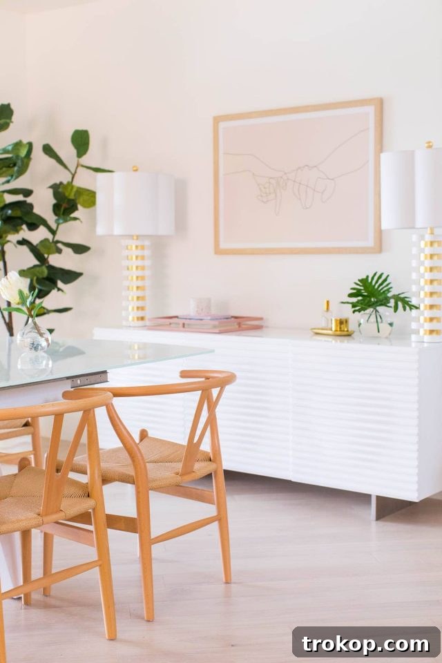Overall view of the open-plan living and dining area, demonstrating the cohesive design and smooth transition between functional zones.