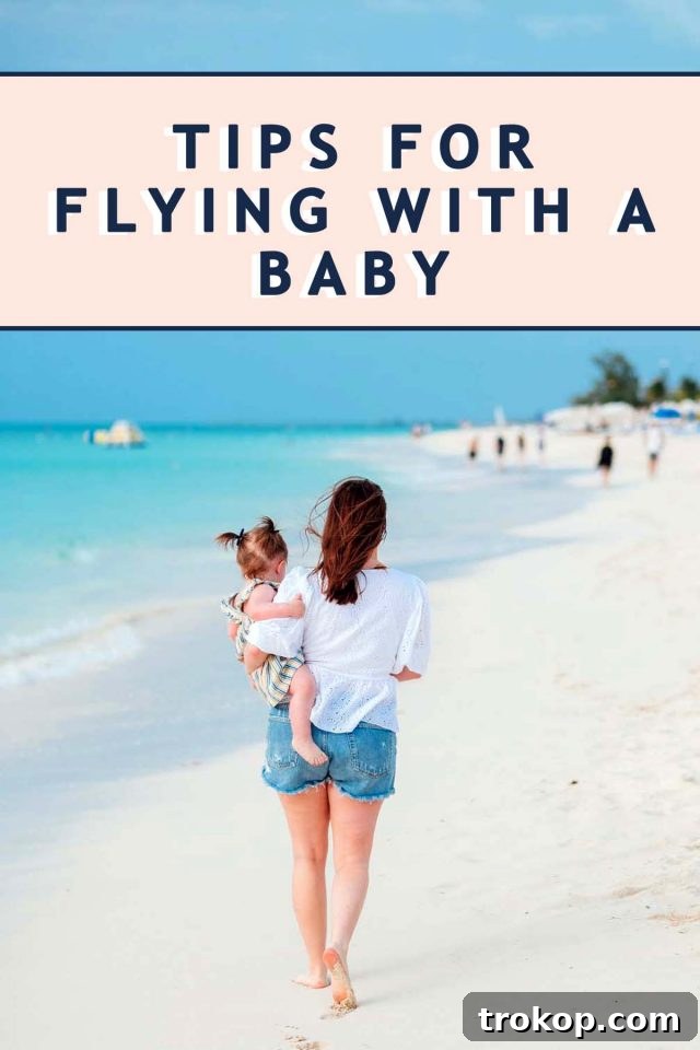 Smooth Skies with Baby: Your Essential Travel Document Checklist 7 photo of a girl on the beach with mom - do kids need id to fly