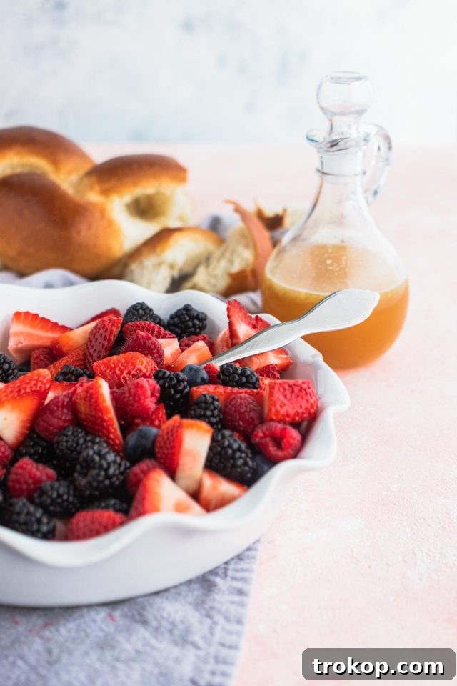 Sweet & Savory Berry Panzanella 2 Fresh Berry Panzanella Salad with vibrant mixed berries and golden challah bread, drizzled with sweet dressing.