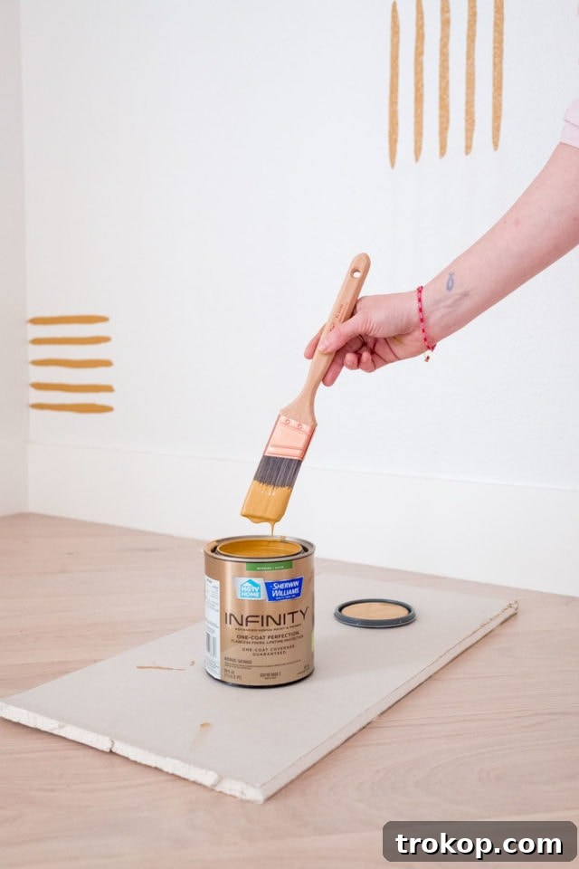 Using a level to ensure straight lines when marking the wall.