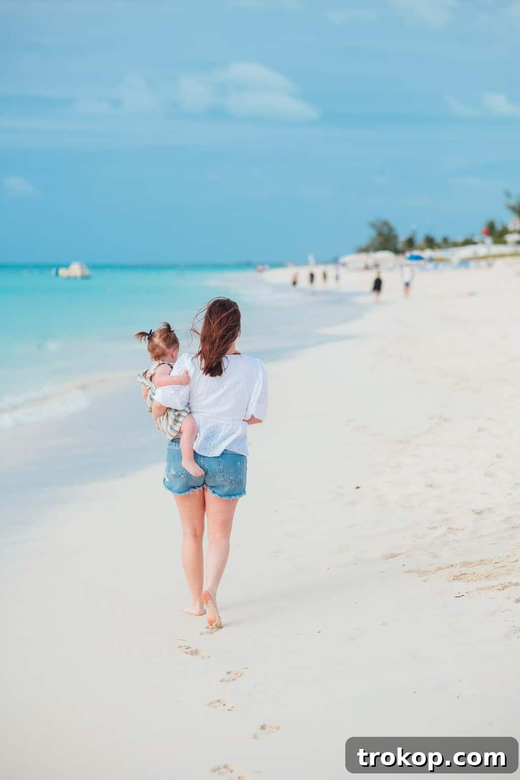 Toddler enjoying the beautiful beach at Beaches Turks & Caicos all-inclusive resort.