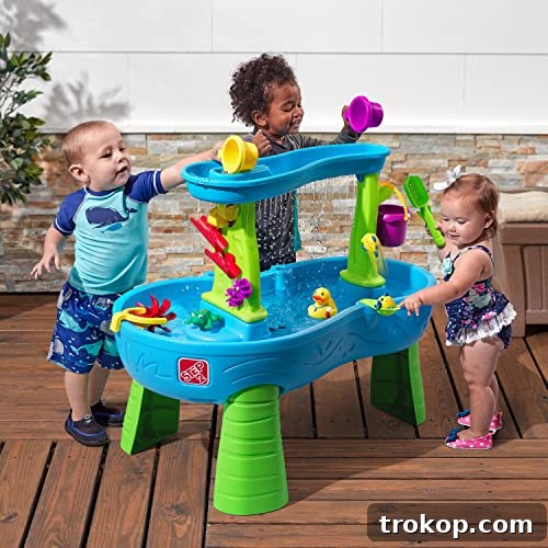 Step2 Rain Showers Splash Pond Water Table | Kids Water Play Table with 13-Pc Accessory Set Step2 Rain Showers Splash Pond Water Table with accessories