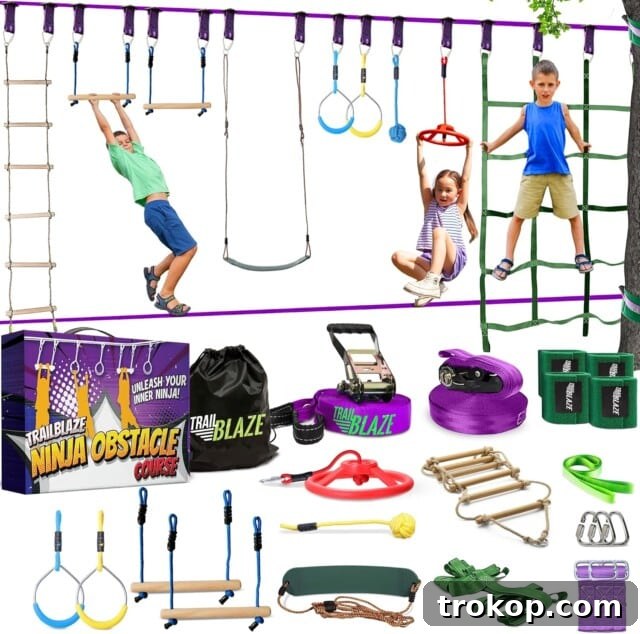Jungle JumpaRoo - Trampoline/Bounce House-Like Play Set - Indoor/Outdoor Jungle Gym with Welded Swing bar - Large Ninja Warrior Obstacle Course for Kids set up in a backyard