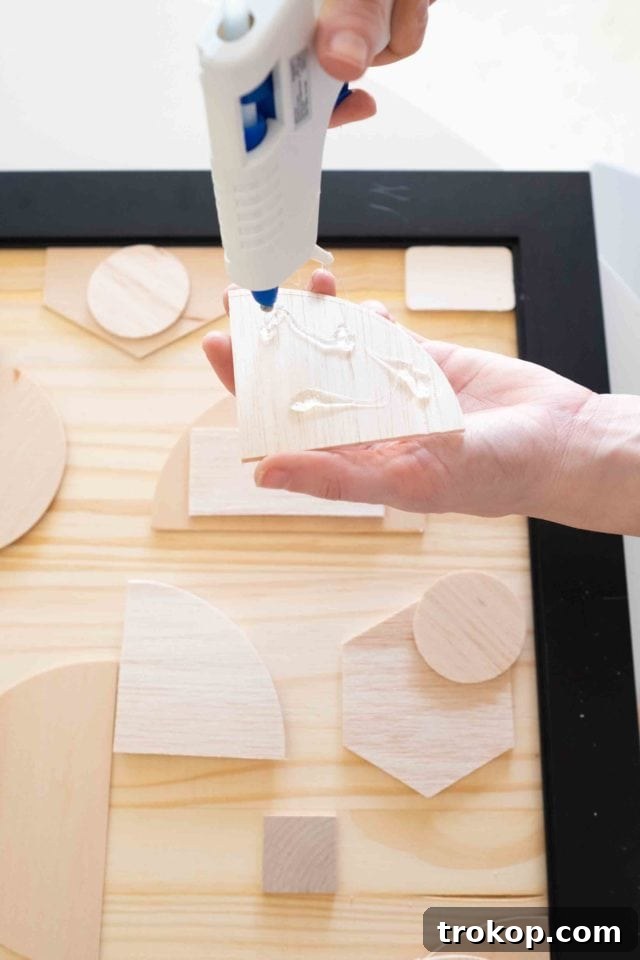 Follow these easy steps to cut wood shapes with your Cricut Maker. From design to execution, create precise components for your unique abstract wood artwork.