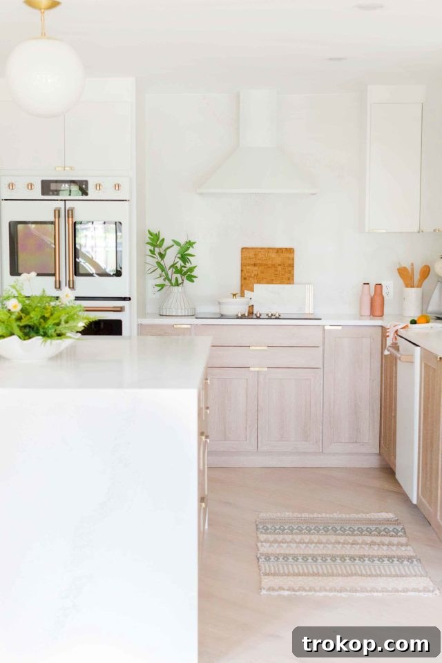 Another perspective of the bright, renovated kitchen